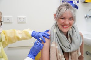 Jessica receiving her COVID-19 vaccination