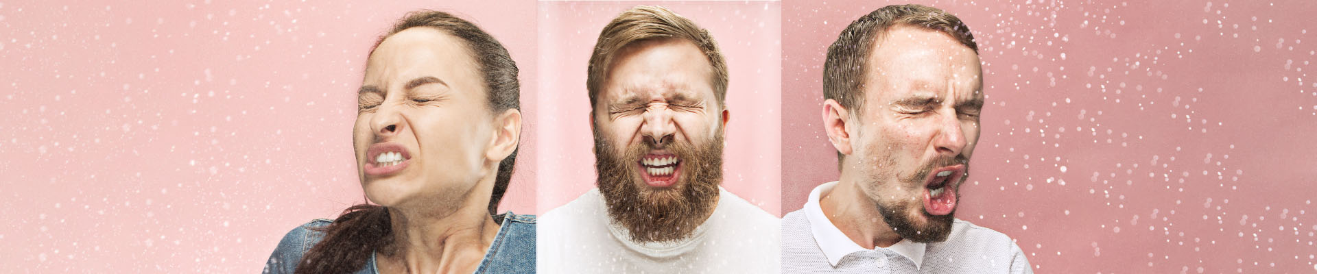 Three people in sneezing without covering their faces.