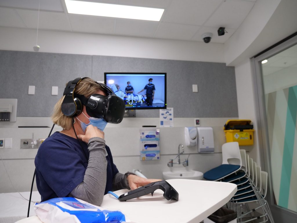 Nurse with VR headset during education simulation